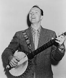 Pete Seeger playing the banjo in 1955