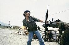 Man in Nicaragua throwing Molotov cocktail.