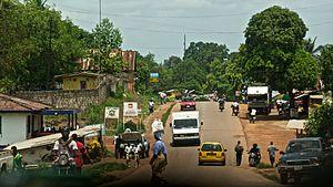 City of Kakata, photograph of main road near BWI, May 2012.jpg