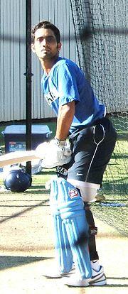 Karthik in a blue uniform