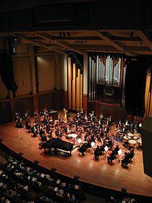 Seattle Symphony Orchestra on stage in Benaroya Hall.jpg