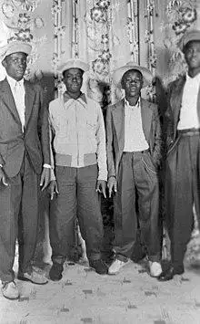 Jimmy Reid and friends in zoot suits with jive chains- Tallahassee, Florida (6308885991).jpg