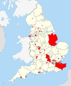 map of English local authorities (9 filled) with 37 scattered filled circles