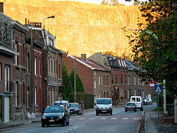 Trooz: main street, with the cliffs behind illuminated by the setting sun