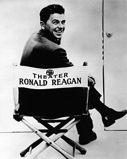 Publicity photograph of Ronald Reagan sitting in General Electric Theater director's chair.jpg
