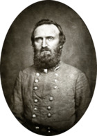 Middle aged man with large beard in military uniform