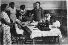 NYA-"Lee County Training School(Negro)"-Tupelo, Mississippi-students at work in library - NARA - 195369.tif