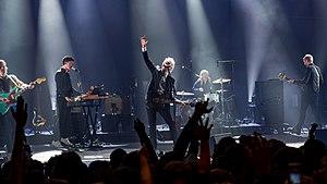 Franz Ferdinand performing live in 2018. From left to right: Bardot, Corrie, Kapranos, Thomson, and Hardy.