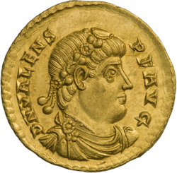 Golden coin depicting man with diadem facing right