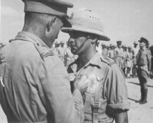 Q Smythe recieving VC from Gen Dan Pienaar.png