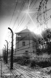 11th April - Buchenwald Concentration Camp liberated by American troops 220px-Bundesarchiv_Bild_183-1983-0825-303%2c_Gedenkst%c3%a4tte_Buchenwald%2c_Wachturm%2c_Stacheldrahtzaun