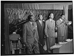 Ben Webster, Eddie Barefield, Buck Clayton, Benny Morton, Famous Door NYC, ca October 1947 (Gottlieb).jpg